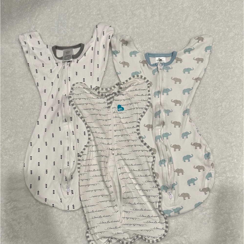 Set of 3 Arms up swaddle sacks.